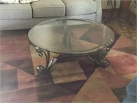 ROUND GLASS TOP COFFEE TABLE - HEAVY METAL BASE