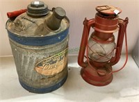 Red railroad lantern and 1 gallon gasoline can by