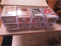 Eight clear plastic boxes of 1990s basketball