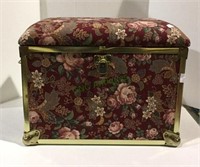 Upholstered trunk with handles and glass block