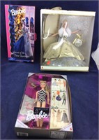 3 Boxed Barbies
