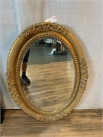 Gilt Floral Motif Oval Wall Mirror