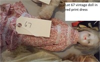 vintage doll in red print dress