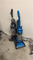Two Vacuum Cleaners
