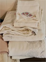 Variety of Table Linens, Some Embroidered