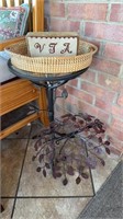 Metal tree branch side table with a glass top,