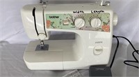 C5) Brother sewing machine. Powers on and sews in