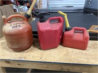 Gas cans plastic, one 1 gallon, one 2 gallon and