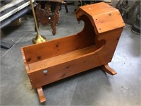 Pine and oak hooded cradle on rockers , 36 inches