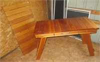 Pair of wood grill tables with folding legs.