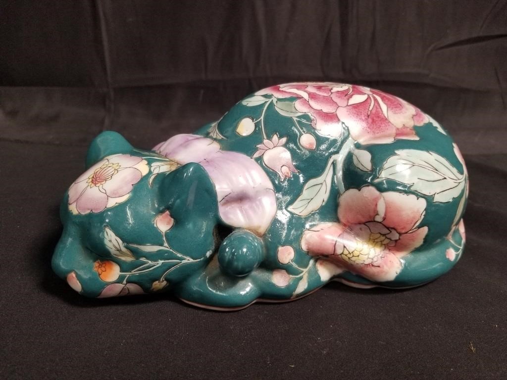 Porcelain sleeping cat figure