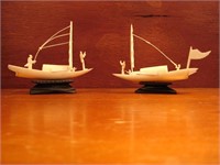 Two ornate Japanese carved ivory sailboats