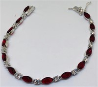 STERLING SILVER CZ BRACELET WITH RED STONE