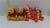 Winnie the Pooh and Tigger stuffies