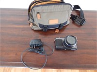 olympus Camera with bag and charger