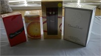 4 unopened perfume packages