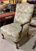 Vintage wooden arm chair with padded seat, back