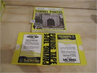 Tunnel portal and paving tape .