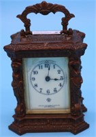 ORNATE BRASS CARRIAGE CLOCK BY ANSONIA, BEVELED