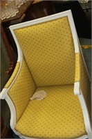 Yellow upholstered chair