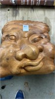Wooden carved face