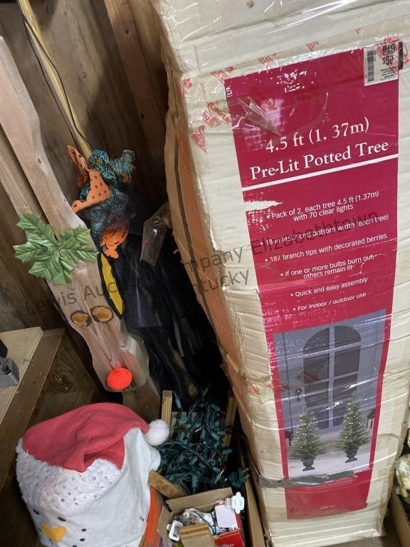 Potted Christmas tree and 2 boxes of Christmas