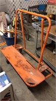 Orange metal rolling cart