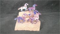 RED CLAY PIECE WITH METAL HORSES