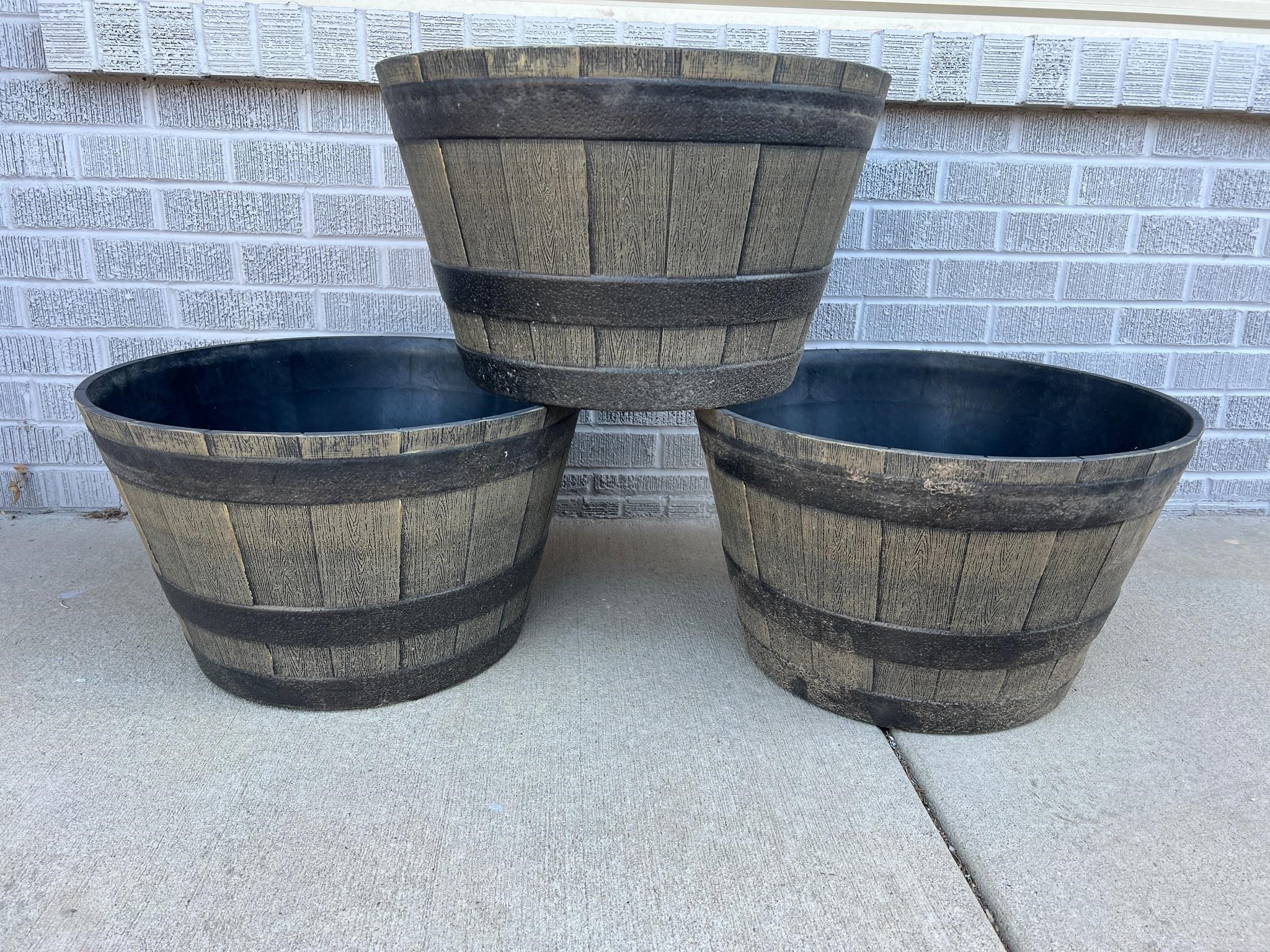 3 large plastic 20” barrel planters used