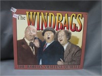 The Three Stooges tin sign .