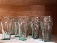 8 pebbled Coca Cola glasses