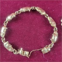 Pig bracelet marked 14k but does not test