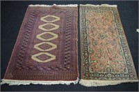 Two vintage floor rugs