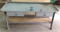 Metal work bench with drawers.