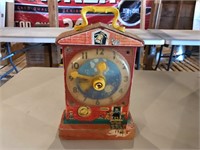 Wooden Fisher Price wind-up toy clock