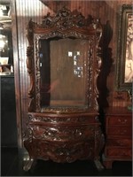 Carved Wood hutch with display glass. 3 drawers.
