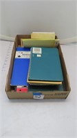assorted notebooks, some partially used