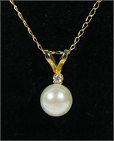 14K Yellow gold pearl pendant with diamond accent