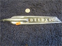 1950'S FORD DELUXE EMBLEM