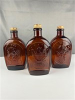 Three 1976 Log Cabin Syrup Patriotic Amber bottles