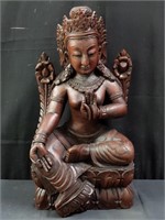 Hand carved wood Buddhist deity sculpture
