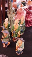 Six Oriental figurines: five are mudmen ranging