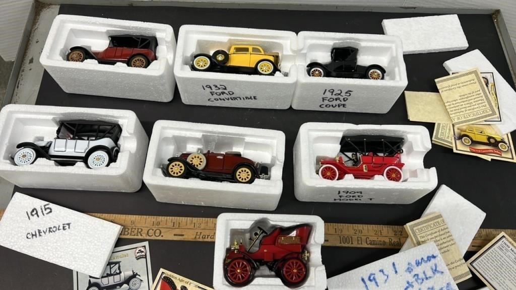 Seven 1/43 scale Toy Cars