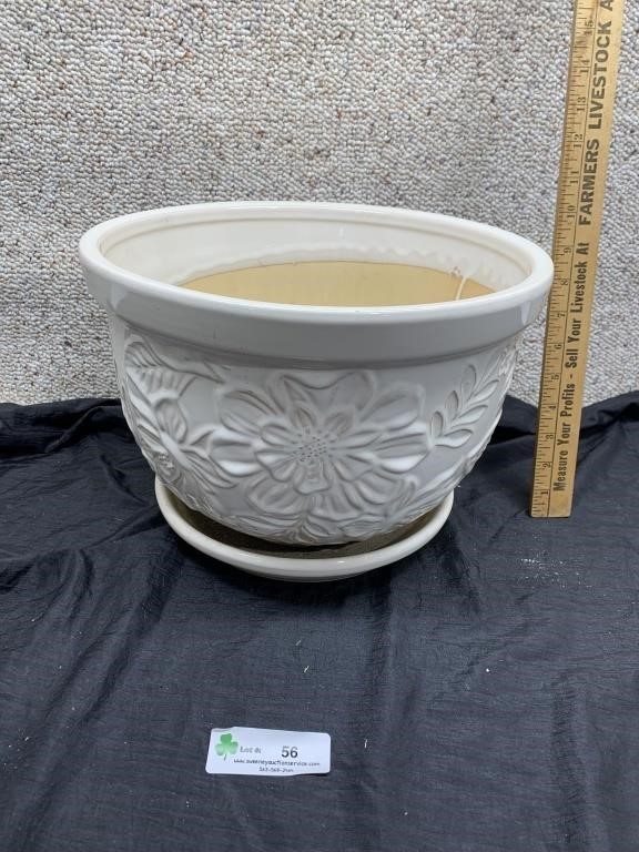 Off white colored ceramic style flower pot