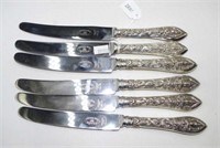 Six Thai sterling silver handle dinner knivies
