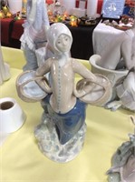 Lladro woman with two baskets