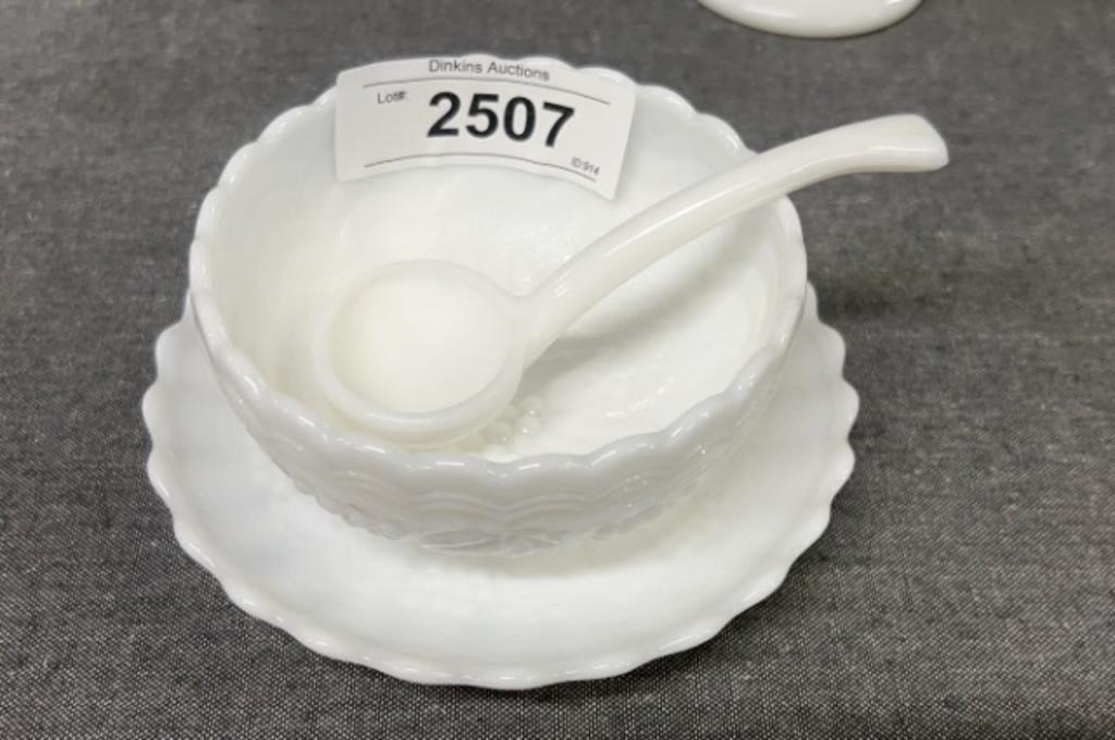 Milk glass bowl with spoon
