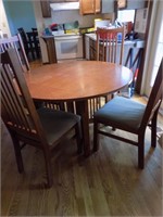 Mission oak style table and 4 chairs with glass tp