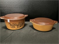 A Pair Of Pyrex Ovenware With Lids.