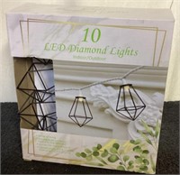 G) new set of 10 LED diamond lights in unopened